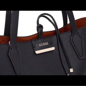 Guess two in one handbag….plus the inside bag is reversible